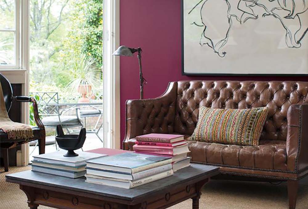 Warm berries, earthly greens and soft blushes come together for a monochromatic concept in the living room