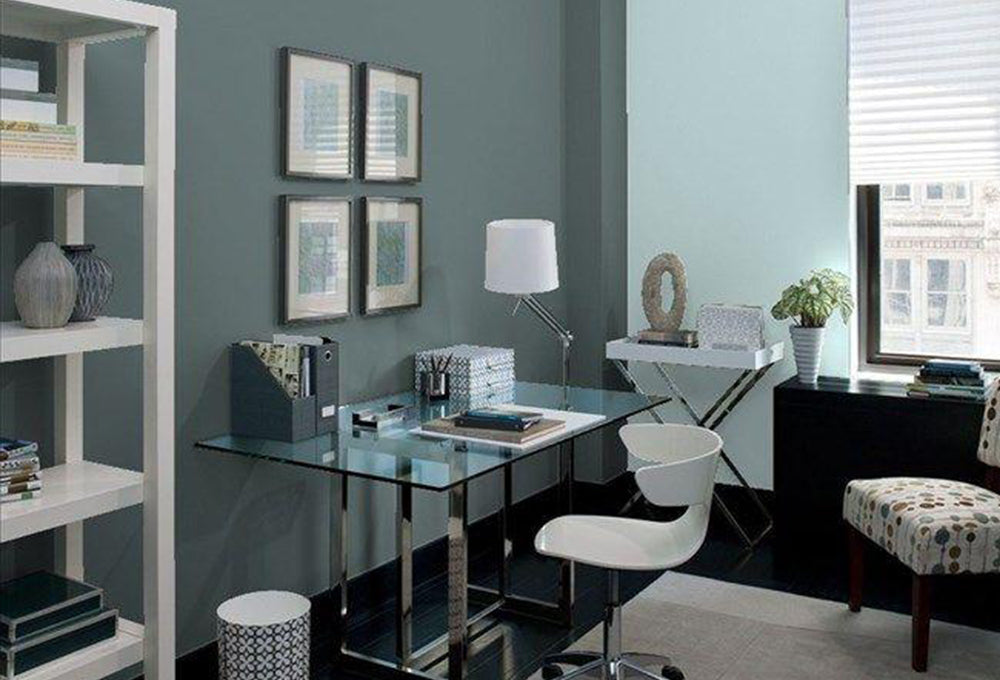 A home office painted teal and light blue. 